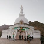 Amala Paul Instagram - The beautiful #shantistupa. It was totally worth the walk up even though i was asked to just rest on the first day to avoid ‘AMS’ , instead i ate ‘SAMOSA’ and hiked! 😬 (only experienced trekkers) #Throwback to #LadakhDiaries #Peace #hike #himalayas