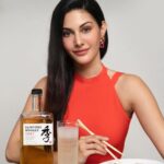 Amyra Dastur Instagram - Absolutely love this #collaboration with TOKI - Japanese Blended Whisky from The House Of Suntory. ✨ Toki means “time” in Japanese. It’s a concept rich in meaning the world over, but particularly in Japan where respect for tradition and reinvention sparks a powerful creative energy. Inspired by that interplay, Suntory Whisky Toki brings together old and new - the House of Suntory’s proud heritage and its innovative spirit - to create a blend that is both groundbreaking and timeless. It can be enjoyed neat, on the rocks or as a highball. I absolutely love how it pairs so will with my favourite Japanese cuisine. A perfect combination to start my first weekend of 2022! Kanpai!🥃 #toki #suntorytoki #yamazaki #hakushu #chita #japanesecraftanship #tokitime #houseofsuntory #suntorytime -Drink Responsibly -The content is for people above 25 years of age only