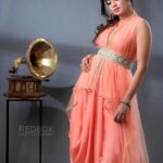 Anjana Rangan Instagram – Peach drape dress from @huesbyanjanaandjeeva 
Photography : @redboxphotography 
MUA : @kalaiartistry 
Hair: @akila_hairstylist