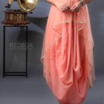 Anjana Rangan Instagram – Peach drape dress from @huesbyanjanaandjeeva 
Photography : @redboxphotography 
MUA : @kalaiartistry 
Hair: @akila_hairstylist