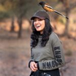 Anju Kurian Instagram - Even the wild birds are much friendlier in Ranthambore. Living my best life with a Rufous Treepie on me and this is how I wish to spend the rest of my days 😍❤️. Thank you @varun.aditya for capturing this magical moment 😍.