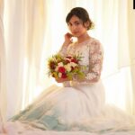 Aparna Vinod Instagram - Outfit:@indrasdesigns MUA:@priyanka.jose.artistry Shot by:@wishnu.jayachandran Concept and Production:@moda.frog @mohithbratnam Location:@poojaeffectsstudio @akashantony #appustar #aparnavinod #aparna #designerwear #bridalgown #bridallook #whitegowm #weddinggown #princessvibes #vaiga Pooja Photo & Recording Studio