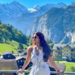 Arthi Venkatesh Instagram - Hello from the Swiss alps🇨🇭 1☀️ vs 2☁️ which is your pick? Interlaken, Switzerland