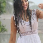 Athulya Ravi Instagram - Let’s get wet in the rain ! And get drenched in love ! ❤️ #rainlover #rainbringhappiness ! White dress by @puella.in 😍