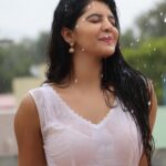 Athulya Ravi Instagram - Let’s get wet in the rain ! And get drenched in love ! ❤️ #rainlover #rainbringhappiness ! White dress by @puella.in 😍