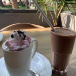 Avantika Mishra Instagram - Hot chocolate, books and looking endlessly out of the window of this cafe by the sea kinda day! #SomeMeTime #HadToKillSixHours #QuaintLittleCafe #GotMyTanOn Miramar beach, Goa
