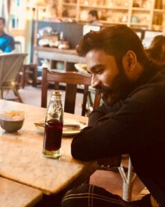 Dhanush Instagram - "Hey en goli soda ve !!" That lyric inspiration moment .. #rowdybaby