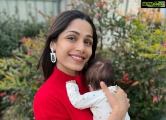 Freida Pinto Instagram - This will forever be my best Christmas with the most precious gift in my arms. Merry Christmas world!❤