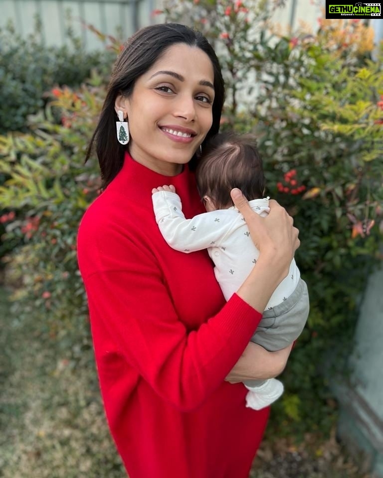 Freida Pinto Instagram - This will forever be my best Christmas with the most precious gift in my arms. Merry Christmas world!❤