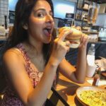 Iswarya Menon Instagram - Ok yes i am goofy & yes I love my burger! Ok bye 👻🤓 . #vacaymode #ohhellyes #foodisbae