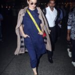 Kangana Ranaut Instagram - #KanganaRanaut returns to Mumbai looking #Dhaakad as ever, giving us all wardrobe goals! . . Dress - @runawaybicycle Trench - @burberry Shoes - @miumiu Sling - @off____white