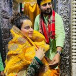 Kangana Ranaut Instagram – Went to Radha Janmbhumi in Barsana …. Priest gave me a perfume and a pan and said Shri Radhe smelt heavenly all the time … which Shri Nath loved but he wasn’t allowed to meet her so he dressed as a women to come to see her in this temple of Shri Radhe where her baby form is worshipped Shri Krishna is worshipped as a Gopi as in dressed in female clothes … 
After Shri Krishna left Gokul there is not much information about Radhe … many say Radha was pink like rose, beautiful like a spell and older to Krishna and also they were related in some way… also in those days as soon as a girl child was born her husband was decided so some say technically she was married as well … but when Krishna left Gokul he gave his flute to Shri Radhe and told her he will never play flute again … and he never did.. after that Radha had a family and children as well …
But not many know when Gokul was gloomy, depressed and hopeless after Krishna left, Shri Radhe played his flute and did Raasleela just how Krishna used to on the shore of Yamuna …
Like I say history conveniently cut out our women and their contribution to man kind may be Krishna knew this so he told Shri Radhe … 
My name will never be uttered without you and Krishan will always come after Radha …
Radhe Krishan 🙏
It was a beautiful day ❤️