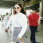 Kangana Ranaut Instagram - 👄👄 CATTITUDE 👄👄 | #kanganaranaut spotted outside the Mumbai airport today 🔥 . . . Shirt: Toteme Skirt: Miu Miu Shoes: Dior Bag: Miu Miu Shades: Tom Ford Video (c) @varindertchawla