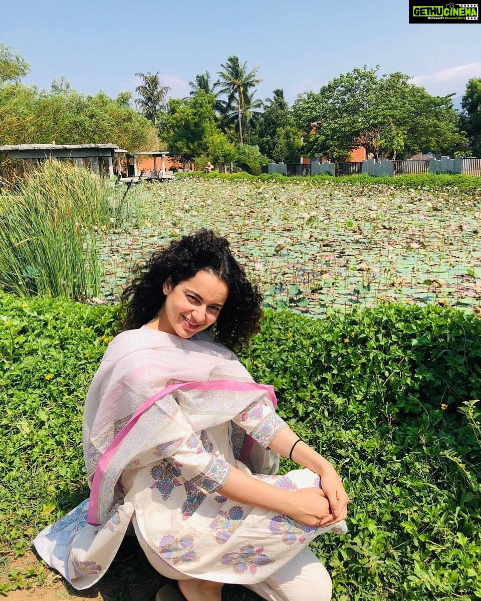 Kangana Ranaut Instagram - #KanganaRanaut during the golden hour, posing next to the lotus pond at Isha Yoga Centre in Coimbatore. She can be seen in a simple attire which signifies the clarity and peace in her mind post yoga-session. Isha Yoga Center