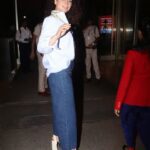 Kangana Ranaut Instagram - Are y'all ready? The Queen makes her way to the airport. 😎 . . Shirt & jeans : @gucci Bag : @off____white Shoes : @ysl Styling: @stylebyami @shnoy09 . #KanganaAtCannes #LiveVictoriously #Greygooselife #Queenatcannes #airportstyle