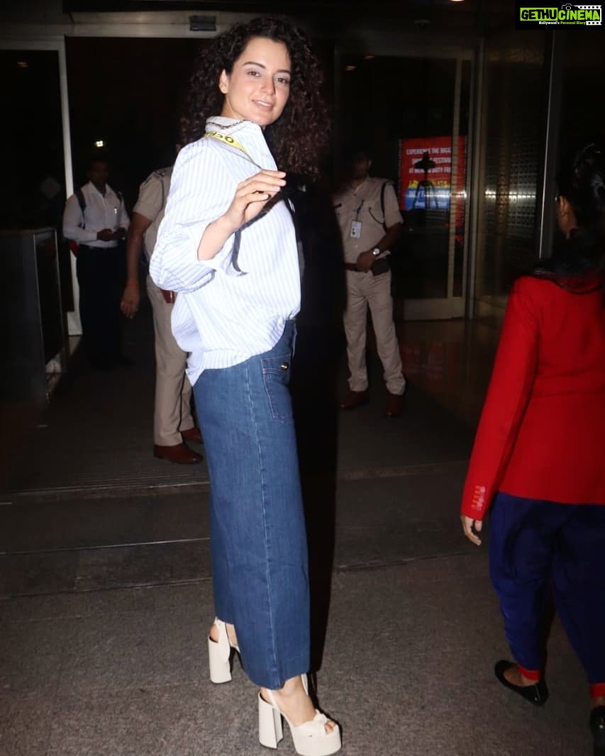 Kangana Ranaut Instagram - Are y'all ready? The Queen makes her way to the airport. 😎 . . Shirt & jeans : @gucci Bag : @off____white Shoes : @ysl Styling: @stylebyami @shnoy09 . #KanganaAtCannes #LiveVictoriously #Greygooselife #Queenatcannes #airportstyle