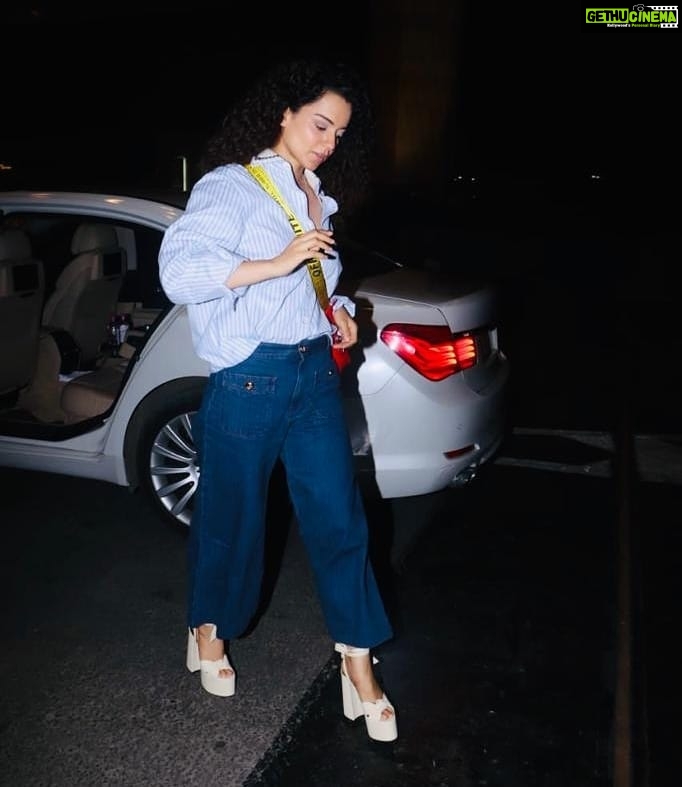 Kangana Ranaut Instagram - Are y'all ready? The Queen makes her way to the airport. β€οΈπ . . Shirt & jeans : @gucci Bag : @off____white Shoes : @ysl Styling: @stylebyami @shnoy09 π . #KanganaAtCannes #LiveVictoriously #Greygooselife #Queenatcannes #airportstyle