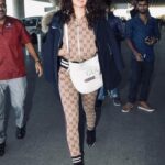 Kangana Ranaut Instagram - AahLeisure! Track suit - @Gucci Overcoat - @moncler Shoes- @louisvuitton Bag- @gucci #Airportlook #athleisure #KanganaRanaut #Airportfashion #ootd #gucci #louisvuitton #ootdfashion #fashioninspo #like #airportoutfit #airportdiaries