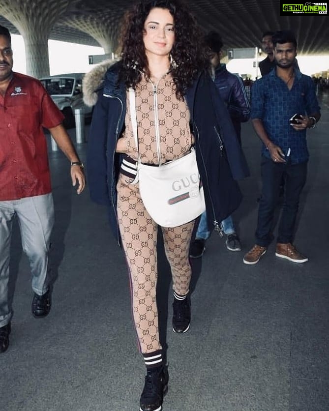 Kangana Ranaut Instagram - AahLeisure! Track suit - @Gucci Overcoat - @moncler Shoes- @louisvuitton Bag- @gucci #Airportlook #athleisure #KanganaRanaut #Airportfashion #ootd #gucci #louisvuitton #ootdfashion #fashioninspo #like #airportoutfit #airportdiaries