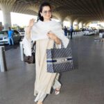 Kangana Ranaut Instagram - #KanganaRanaut spotted today at the airport as she leaves for Chennai in a fresh and happy spring ensemble paired with kitten heels and a tote bag. 🌸🌼