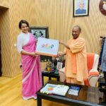 Kangana Ranaut Instagram - I thanked Uttar Pradesh government for their cooperation in our film ( Tejas) shooting and wished Honourable Chief Minister best of luck in his upcoming elections…. I emphasised that we had a tapasavi Raja from Uttar Pradesh Shri Ram Chandra and now we have Yogi AdityaNath … May your reign continues Maharaj ji 🙏 He gifted me a coin which was used at Ram Janm Bhumi Pujan …. What a memorable evening thank you Maharaj ji 🙏💐