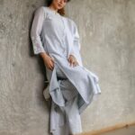 Kangana Ranaut Instagram - #KanganaRanaut stuns in a silver & grey Indian kurta-pyjama set, paired with white heels and loosely tied low pony (in what we call an iconic Kangana texture) 🤩👸 . . . #MahatmaGandhi #Gandhi150 #Gandhi . . . Photographer: @_sanu313_