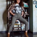 Kangana Ranaut Instagram – Autumn style done right! ✨

Today’s uber chic look is a fun combo of a classic trenchcoat over a graphic T-shirt, checkered pants, and suede boots. All set to walk the grand finale at #indiafashionweek 🥰 stay tuned! #lmifwss20

Photo Courtesy: @_sanu313_