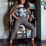 Kangana Ranaut Instagram – Autumn style done right! ✨
Today’s uber chic look is a fun combo of a classic trenchcoat over a graphic T-shirt, checkered pants, and suede boots. All set to walk the grand finale at #indiafashionweek 🥰 stay tuned! #lmifwss20
Photo Courtesy: @_sanu313_