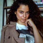 Kangana Ranaut Instagram – Autumn style done right! ✨
Today’s uber chic look is a fun combo of a classic trenchcoat over a graphic T-shirt, checkered pants, and suede boots. All set to walk the grand finale at #indiafashionweek 🥰 stay tuned! #lmifwss20
Photo Courtesy: @_sanu313_