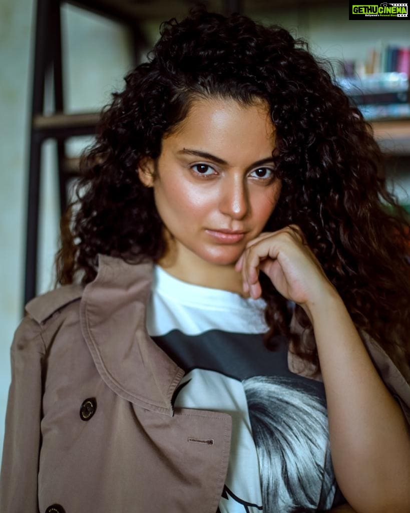Kangana Ranaut Instagram - Autumn style done right! ✨ Today's uber chic look is a fun combo of a classic trenchcoat over a graphic T-shirt, checkered pants, and suede boots. All set to walk the grand finale at #indiafashionweek 🥰 stay tuned! #lmifwss20 Photo Courtesy: @_sanu313_