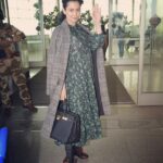 Kangana Ranaut Instagram - Spotted #KanganaRanaut at the airport in what we call a perfect Fall-Winter look. An oversized dress paired with a vintage-inspired duster coat, leather rights and statement boots. 😍😍😍