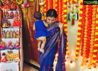 M.M. Manasi Instagram - Day 7 Royal blue with my princess💙 This beautiful saree was a gift from my brother @dr.ajaymosur and sister-in-law @kljanaki88 💓 Saree shapewear from @mayilibynandhini ..💖 And Swara Bubu’s dress and matching hairband was speacially made for her by her dearest paati(My Mother-in-law)💙 #Swara #ourdaughter #babygirl #navaratri2021 #ColoursOfNavaratri #Day7 #RoyalBlue #saree #sareestagram #sareelove #daughter