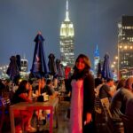 Meera Nandan Instagram – Sleepless nights and city lights ✨ 

.

#lastweeksametime #empirestatebuilding #nyc #newyorkhasmyheart #holiday #muchdeserved #whatatrip #vacay2021 #solotrip #travel #ustrip2021 #love #positivevibes 230 Fifth: Best Heated Rooftop Bar/Club/Restaurant In NYC