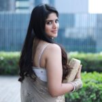 Megha Akash Instagram - New beginnings ✨ #Ravanasura • Styled by @officialanahita Outfit: @paaprikastore @reach.swetha x @manalirawat Earrings: @rubansaccessories Rings: @aristajewels.in Clutch: @accessoriesbyanandita Pic: @thescienceofphoto