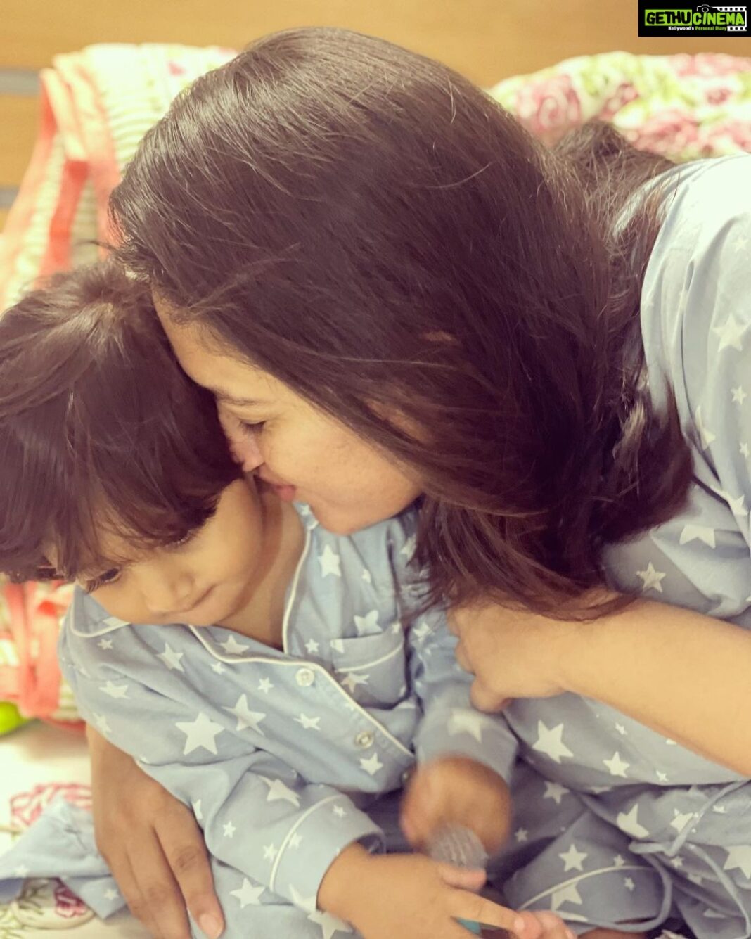 Meghana Raj Instagram - Our baby…. Our world… our universe… our EVERYTHING! CHIRU… our lil prince is ONE YEAR OLD! I will squish him till he says ‘amma stop!’ And continue squishing him till he turns red wid embarrassment! Will smother him wid kisses til he rolls his eyes and says, ‘amma!’ And will continue smothering him witb more kisses! I love u my baby child… ur growing up so so fast!! I wish we cld just lay cuddled in each others arms for all eternity! HAPPY BIRTHDAY RAAYAN! Appa and amma love you! ❤️ @lasya_umesh thank you for this click!!! We love u! @kiddlekiddlle this is definitely very special!