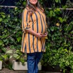 Meghana Raj Instagram – Celebrating the best thing about being a woman! Being able to create life! The feeling of being a mother just cannot be put into words … in this journey of mine the team of @charismomic and its founder #veenanayar have been a big support and a positive presence in my life!Pregnancy can be pretty challenging with wardrobes. Along with all the pampering  comes a lot of social opinions and judgments. Some of them might just be a myth. I remember being advised never to wear jeans during pregnancy. As our body begins to take new shape, circumstances may require us to wear stylish & trendy outfits including jeans. I found mine at @Charismomic and it has been the most comfortable and smartest  wear. Unlike regular jeans, these are designed to fit easily and they come in stretchable fabric along the waist to accommodate our growing bump. The  fabric is extremely soft and breathable on my bump.

Here’s to all the strong women, be fearless, be a woman of your choices,  be unstoppable! Happy women’s day! Makeup by @shalinismakeupprofile. hairstyling by @makeover_by_raghu_nagaraj_n 

#womensday#wearwhatyou like#fashionforall
#charismomic
#maternitysuperstore