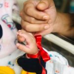 Meghana Raj Instagram - Time of miracles! 🎄 my lil gift trying 2 wrap his tiny hands around mine ❤️ Cant thank u enough Baby Ma... the best gift u have ever given me... we love u! Waiting for u! Photo Credit @lasya_umesh