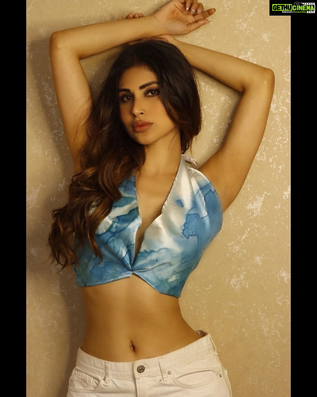Mouni Roy Instagram - “And of a Sunday swarm the folk Under the honeysuckle vine, Quaffing, the while they talk and dance, The sun, the melody, the wine.” - Theophile Gautier. • • • @ragdoll.in Style @nidhikurda 📸 @lensshot_photography_