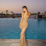 Mouni Roy Instagram - ‘Tis was all magic… • • • • • 📸 @is.r_art 👗 @nadinemerabi 🤩 @palazzoversacedubai @shamimkassibawi Hair & face: me 💁🏻‍♀️