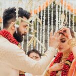 Mouni Roy Instagram - I found him at last ..♥️ Hand in hand, blessed by family & friends, We are married!!!!!!!!!!! Need your love and blessings… 27.01.22 Love, Suraj & Mouni Hilton Goa Resort