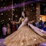 Mouni Roy Instagram - Sun, moon & the stars..✨ संगीत #favsoirée • • • My stunning lehenga by @falgunishanepeacockindia thank you ♥️ Jewellery my fav 🤩 @golecha_jewels Style by my @rishika_devnani Wedding planners : @neferrtitiweddings Decor & styling : @neferrtitiweddings Hospitality partner : @hiltongoaresort Videography team : @theweddingjournalsofindia Photography team : @priyamparikhpictures Hospitality management: @Bgc.event Technical partner : @resonateproblr DJ: @dj_sharath Stationary partner : @puneetguptainvitations Unforgettable memories created by @reemasang @studioneelabh Thank you @thehimanisingh for playing at the after party. Lots of love ♥️ Hilton Goa Resort