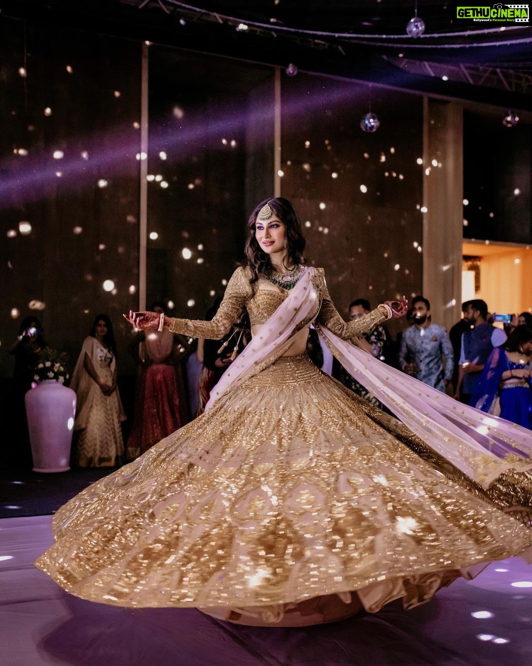 Mouni Roy Instagram - Sun, moon & the stars..✨ संगीत #favsoirée • • • My stunning lehenga by @falgunishanepeacockindia thank you ♥️ Jewellery my fav 🤩 @golecha_jewels Style by my @rishika_devnani Wedding planners : @neferrtitiweddings Decor & styling : @neferrtitiweddings Hospitality partner : @hiltongoaresort Videography team : @theweddingjournalsofindia Photography team : @priyamparikhpictures Hospitality management: @Bgc.event Technical partner : @resonateproblr DJ: @dj_sharath Stationary partner : @puneetguptainvitations Unforgettable memories created by @reemasang @studioneelabh Thank you @thehimanisingh for playing at the after party. Lots of love ♥️ Hilton Goa Resort