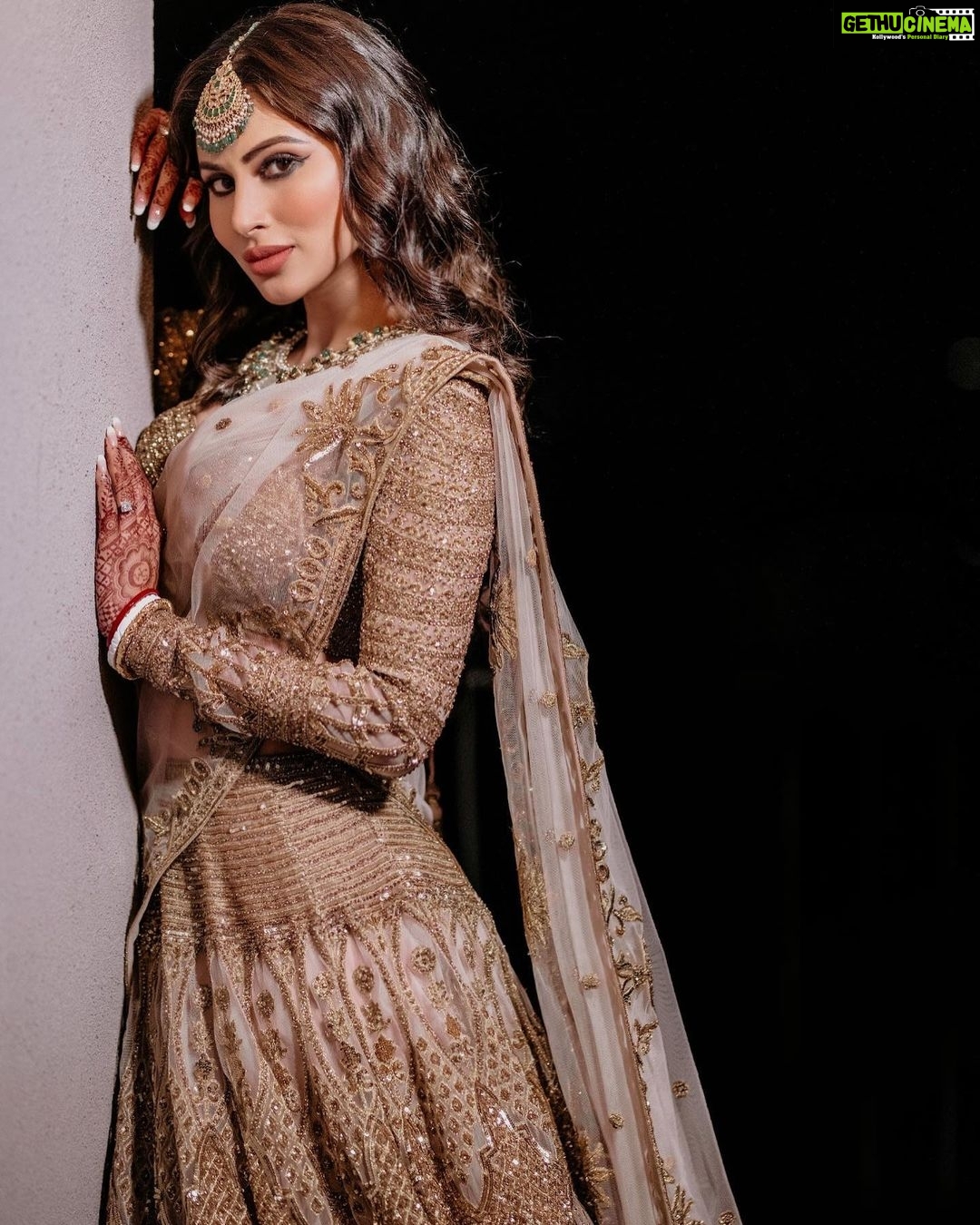 Mouni Roy Instagram - Stars & my loon moon ✨ संगीत #favsoirée • • • My stunning lehenga by @falgunishanepeacockindia thank you ♥️ Jewellery my fav 🤩 @golecha_jewels Style by my @rishika_devnani Hair @chettiarqueensly Make up @mukeshpatilmakeup Wedding planners : @neferrtitiweddings Decor & styling : @neferrtitiweddings Hospitality partner : @hiltongoaresort Filmography: @theweddingjournalsofindia Photography team : @priyamparikhpictures Hospitality management: @Bgc.event Technical partner : @resonateproblr DJ: @dj_sharath Stationary partner : @puneet_gupta_invitations Unforgettable memories created by @reemasang @studioneelabh After party @thehimanisingh