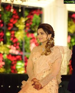 Nakshathra Nagesh Instagram - One month since our big day! 🧿❤️ and more than one year since @sameenasofficial started making this dress for me 🥰
.
.
. 
I walked into @sameenasofficial shortly after my engagement to discuss my wedding blouses and as always, giving her a full life update, talking to her about all other events and what I wish to wear, and casually mentioned to her that I was struggling to find the perfect dress for my reception. It didn’t take her 10 seconds before she said “I’ll make it for you”. The rest is history. Asmitha did everything! From finding a hundred different designs for me to choose from, going up and down several stores to find the perfect colour, buying the entire roll of fabric because she didn’t want anyone else making a dress in the exact same colour (and using it all in my dress because she loves me a little extra), hand embroidered every single element on the dress on the front, the back and the sleeves, keeping me excited through the 100 times we had to postpone the wedding, constantly having me over for trials, helping me out with other aspects of the wedding. She’s been my rock! ❤️ 
.
.
.
Thank you @sameenasofficial for making me wedding looks better than my dream. I am ever so grateful. 
.
.
.
Happy monthiversary to us 🥳
.
.
Dream decor @eventjunctionofficialpage 
Hair @mani_stylist_ 
Groom makeover @chella_hair_makeup 
Glam squad @yesu_thebunny @profile_makeover @sonaldjain25996 
Photography @haran_official_