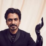 Nawazuddin Siddiqui Instagram - Gratitude !!! Posted @withregram • @filmfare Shine on! Best Actor, Web Original Film (Male), #NawazuddinSiddiqui was photographed with his Black Lady at the #MyGlammFilmfareOTTAwards 2021. 📸: @keegancrasto