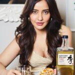 Neha Sharma Instagram - An amazing #collaboration with TOKI - The Japanese Blended Whisky from The House Of Suntory! TOKI is a blend of luxury whiskies from Japan's iconic Yamazaki, Hakushu and Chita distilleries. It’s timelessness and versatility as a whisky blend is inspired by reinvention. Appreciating the finer things with Toki this weekend. It’s #TokiTime ! Kanpai!! • • • #toki #suntorytoki #yamazaki #hakushu #chita #japanesecraftsmanship #tokitime #HouseOfSuntory #suntorytime -Drink Responsibly -The content is for people above 25 years of age only