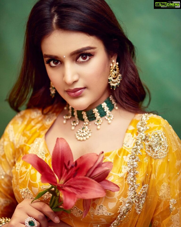 Nidhhi Agerwal Instagram - Hoping everybody had a good #sankranti 💛 feeling so grateful for the positive and hit response for our film #hero 🧿 Styled by @officialanahita Outfit: @paulmiandharsh Jewellery: @mangatraineeraj Pics: @akshay.rao.visuals
