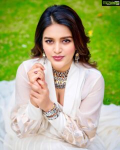 Nidhhi Agerwal Instagram - A flamingo in a flock of pigeons 🦩🦩🦩🦩🦩🦩🦩🦩🦩

#hero 

Styled by @officialanahita 
Outfit: @maddermuch 
Shoes: @dior 
Pic: @v_capturesphotography 
Makeup: @madhu_derangula