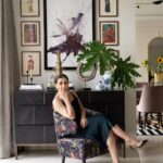 Nikki Galrani Instagram - Home is where this story begins ♥️ #HomeSweetHome #HappyHome My living room embraces a minimal yet modern interior style. Choosing handcrafted furniture from @magari.india enhanced my space with the contemporary visual identity, I was looking for. The console table from Magari is a statement piece. Crafted with solid wood and sleek metal inlays, it is truly a combination of craftsmanship & functionality✨ The arm chairs are gorgeous accent pieces in luxurious printed fabric from @yavanika.india The chairs are ergonomically built providing the most comfortable seating experience. Head to @magari.India for more details ✨ Interior Designer : @farahagarwal x @chestnutstoreys Shot by : @_yashrjain Retouched by : @kiransaphotography Interior Stylist : @sam_wade11