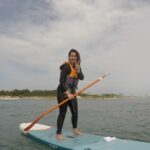Nikki Galrani Instagram - Mid Week Blues🌊 @kuttisurf @mani_surfer ✨ #FirstOfMany #StanUpPaddle #ReelsOfInstagram #ReelitFeelit